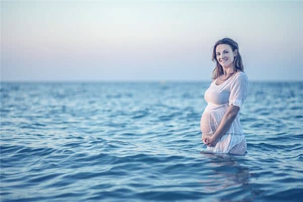 梦到熟人挺着大肚子是什么意思