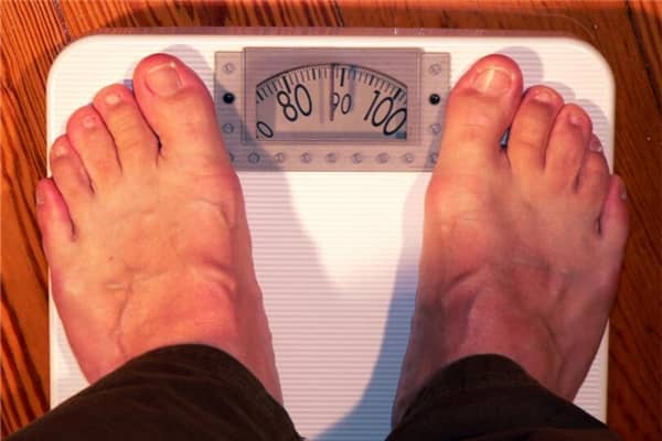 梦到称体重有具体数字是什么意思